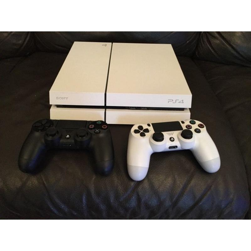 PS4 White With 2 Games and 2 Controllers.