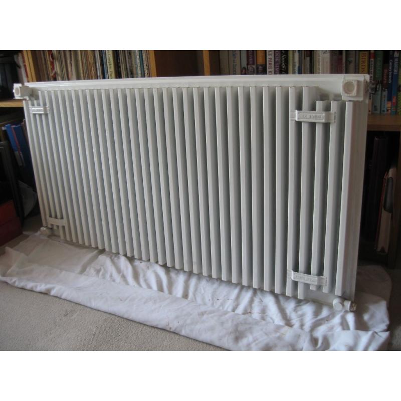 White radiator with grille cover