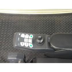 Invacare Spectra Plus electric wheelchair with rising tilt in space seat electric leg lifts etc