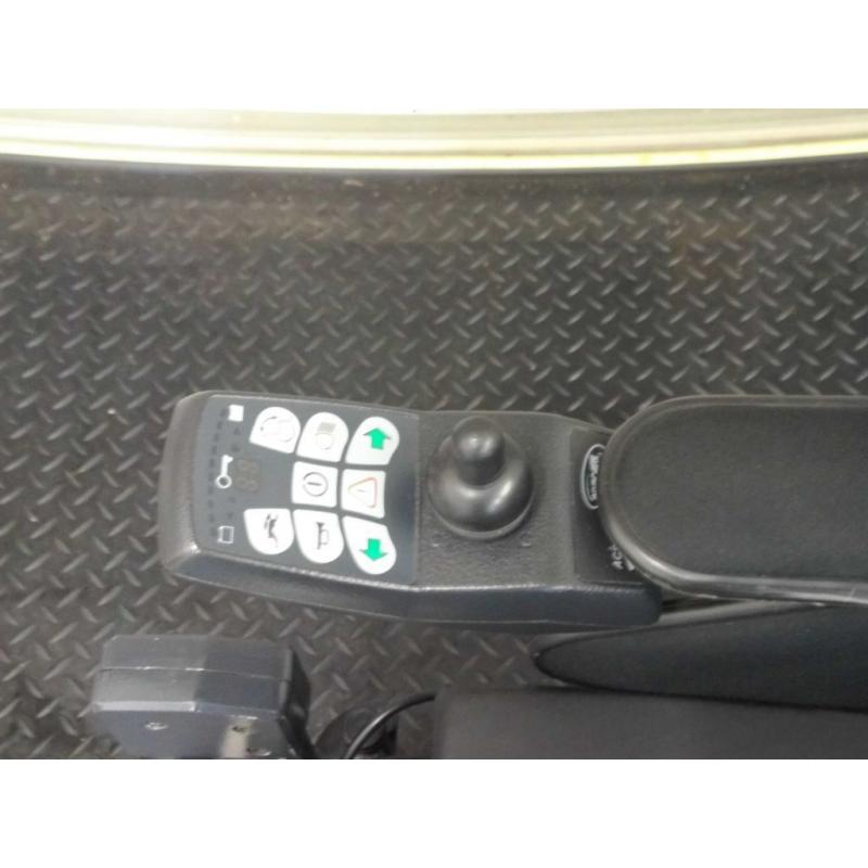 Invacare Spectra Plus electric wheelchair with rising tilt in space seat electric leg lifts etc