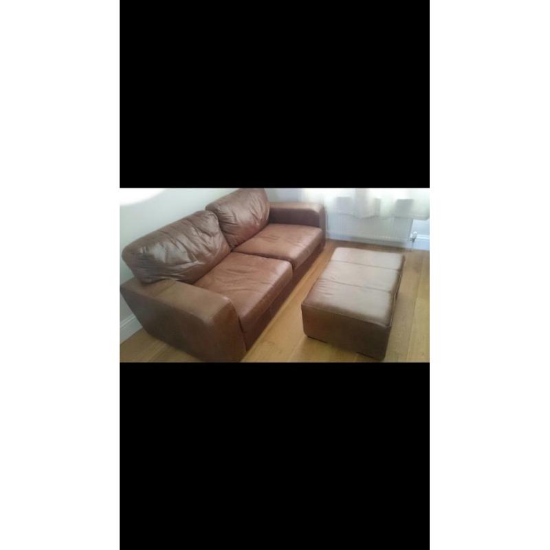 Real Italian leather sofa, armchair and footrest. Excellent condition.