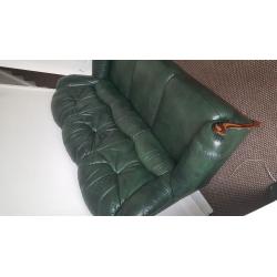 Green leather three seater sofa with armchair