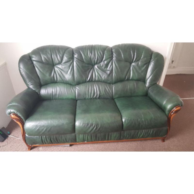 Green leather three seater sofa with armchair