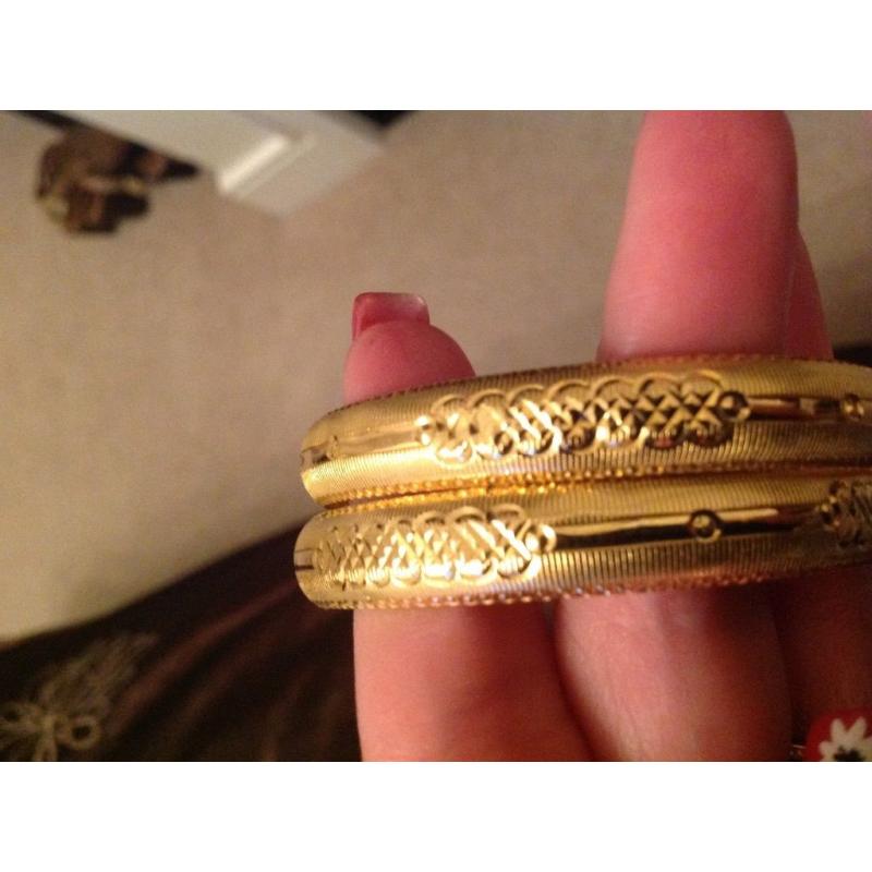 Pair Of Gold Bangles