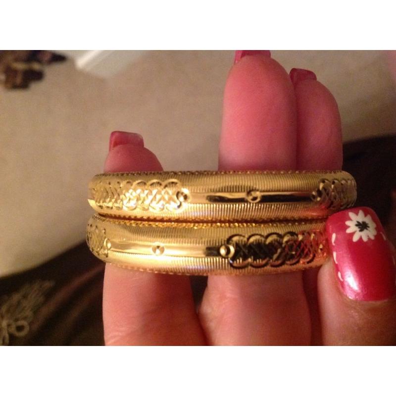 Pair Of Gold Bangles
