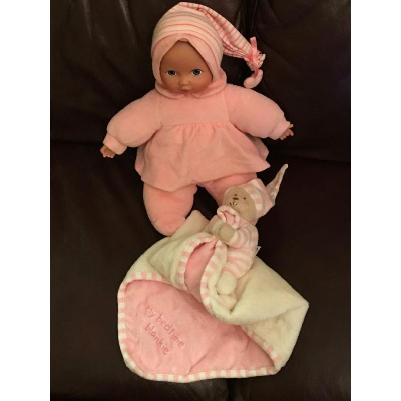 Lot doll and pink blanket