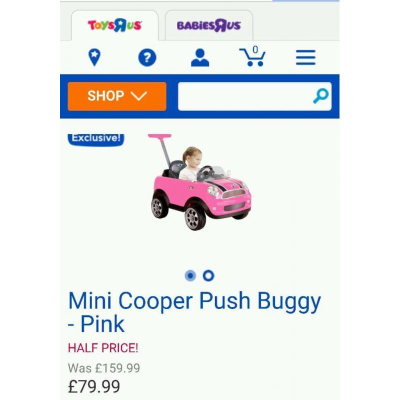 Pink mini cooper push along car