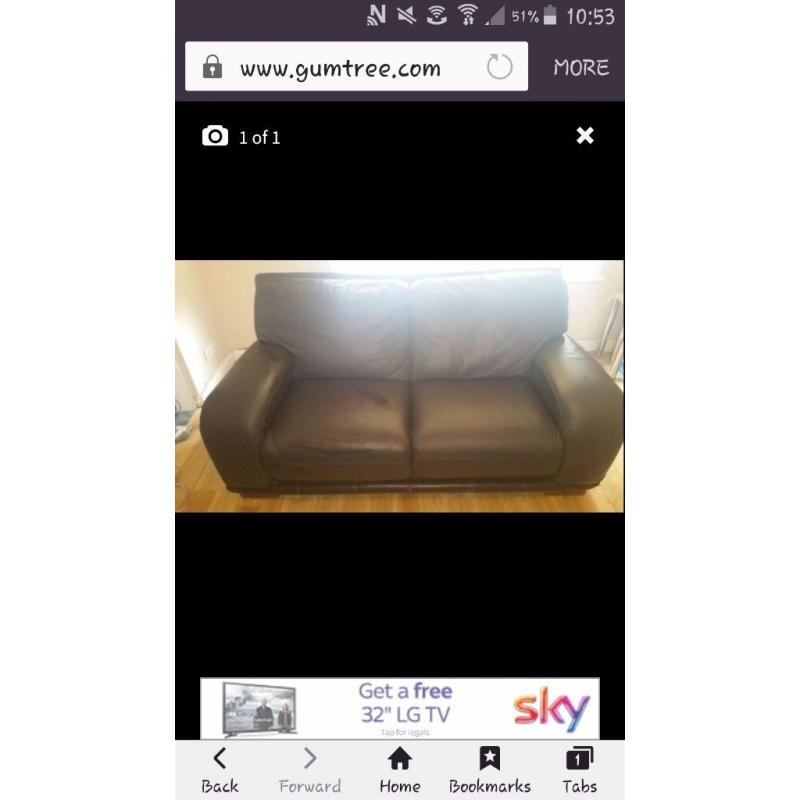 Large 2 seater brown leather sofa