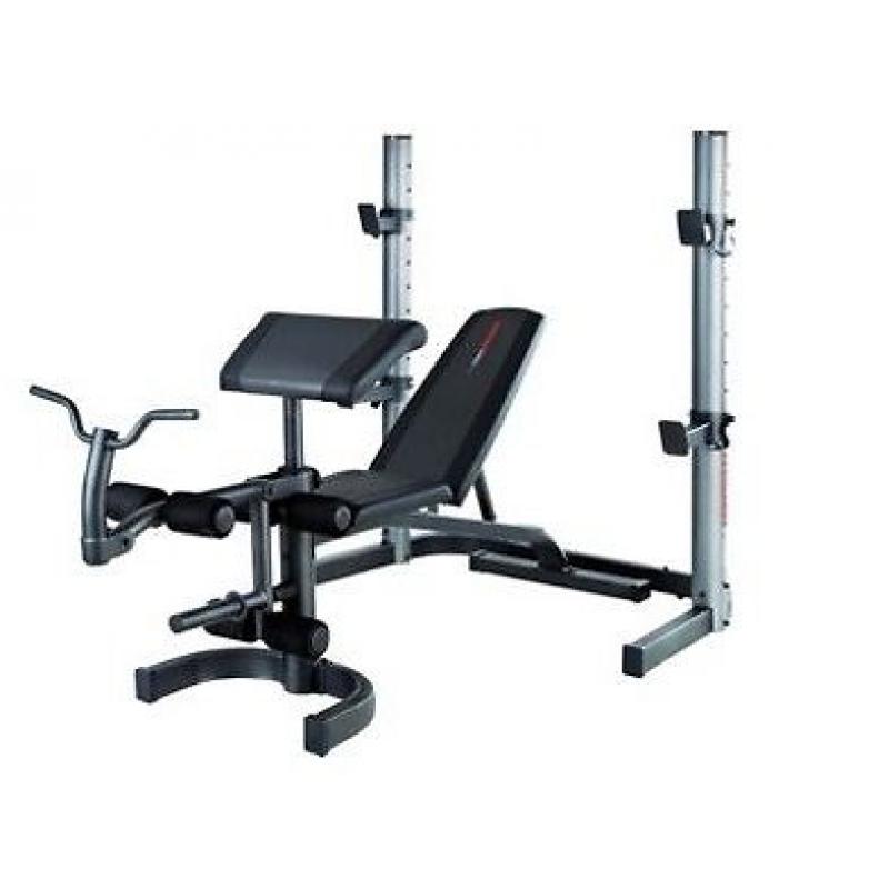 Olympic weights (100kg) incl 7 ft barbell, adjustable bench, squat stand, dumbells, ab bench sale