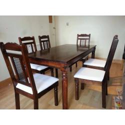 solid wood dining table + 6 matching chairs