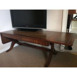 Coffee table. Mahogany with leather inlay