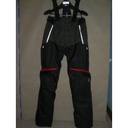 ARMR MOTO waterproof textile motorcycle trousers.