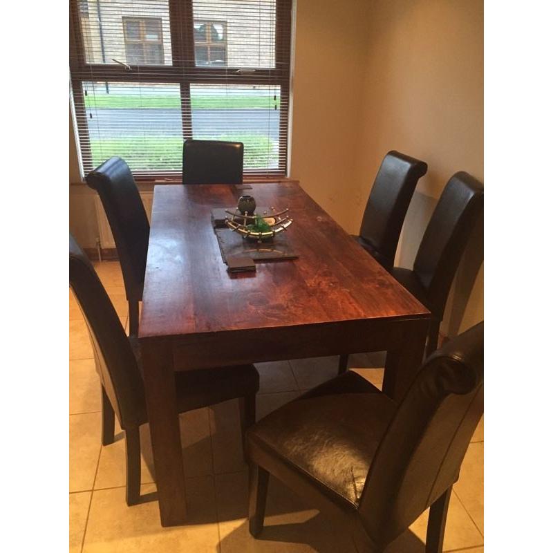 Heavy and Solid dining table and 6 chairs