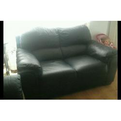 2 and 3 seater black leather sofa
