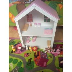 Rosebud cottage dolls house