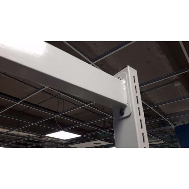 Large quantity of double sided metal shelving