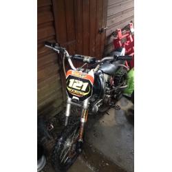 M2R 140CC oil cooled pit bike. Needs side caseing, throttle and break connecting as I got no time