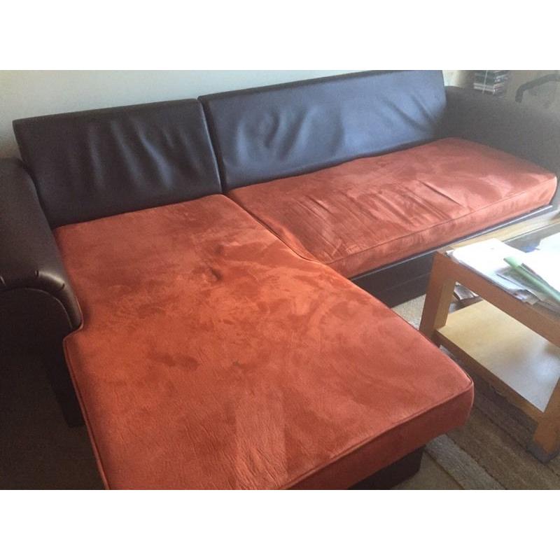 Corner sofa bed in terracotta