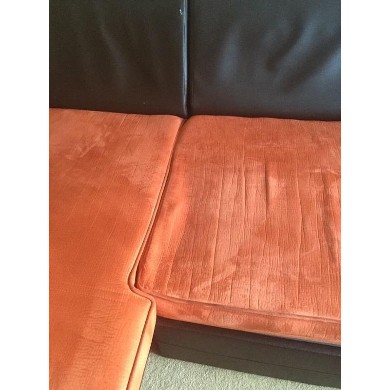 Corner sofa bed in terracotta