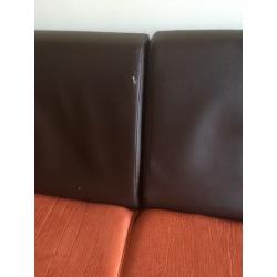 Corner sofa bed in terracotta