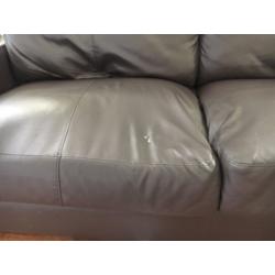X2 leather style choc sofas one v.good condition one with defects