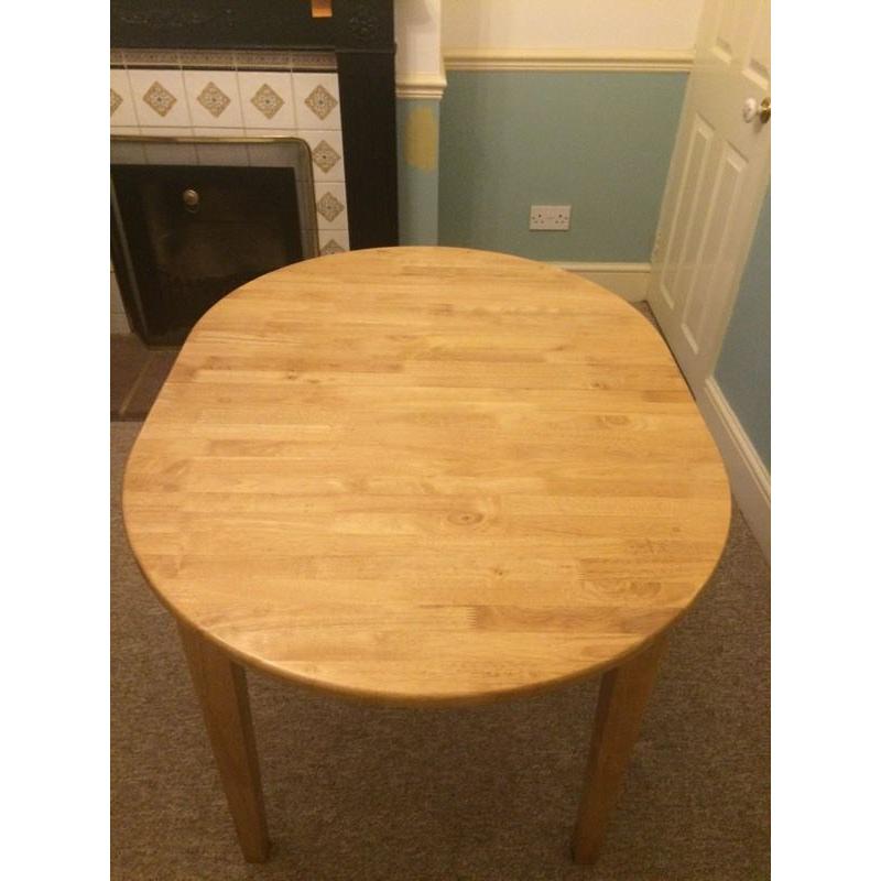 Solid wood extendable dining table