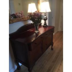 Antique sideboard with claw and ball feet