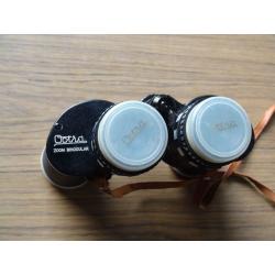 Octra Zoom Binoculars 7x-12x 40 Field 5.5 at 12x, used, with original field case.