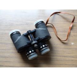 Octra Zoom Binoculars 7x-12x 40 Field 5.5 at 12x, used, with original field case.