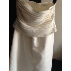 Ivory coloured wedding dress.