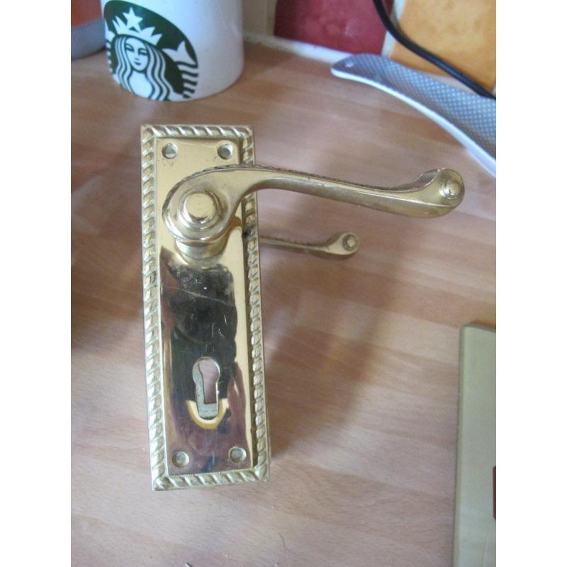 4 pairs of brass door handles