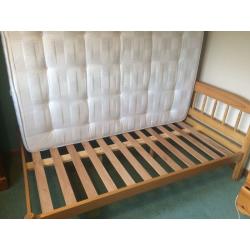Small Double (three quarter) wooden bed stead and Sleepmasters firm mattress.