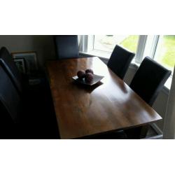 Solid wood dining table and six leather chairs