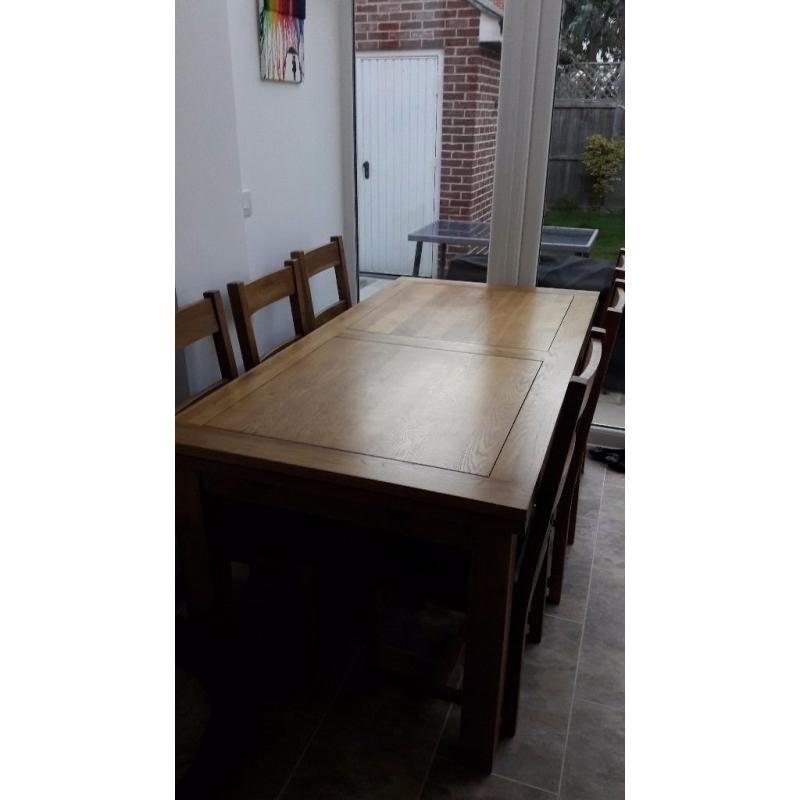 Solid Oak Dining Table with 6 chairs, only 2 years old. Great condition!