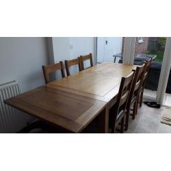 Solid Oak Dining Table with 6 chairs, only 2 years old. Great condition!