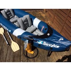 Riviera inflatable kayak with 2 oars & pump backpack