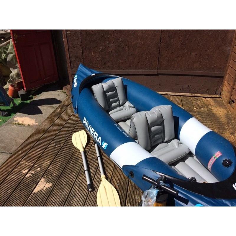 Riviera inflatable kayak with 2 oars & pump backpack