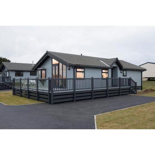 TIMBER CLAD LUXURY LODGE 35x20 WITH GLASS DECKING AT SOUTHERNESS HOLIDAY PARK, FINANCE OPTIONS!!
