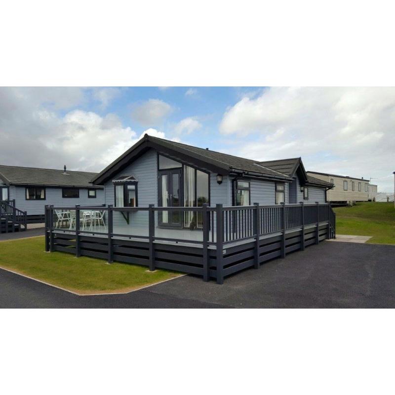 TIMBER CLAD LUXURY LODGE 35x20 WITH GLASS DECKING AT SOUTHERNESS HOLIDAY PARK, FINANCE OPTIONS!!