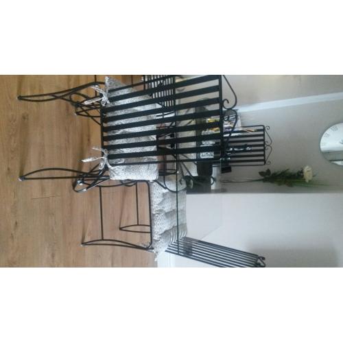 Solid wrought iron dinning table with 4 high back solid chairs,