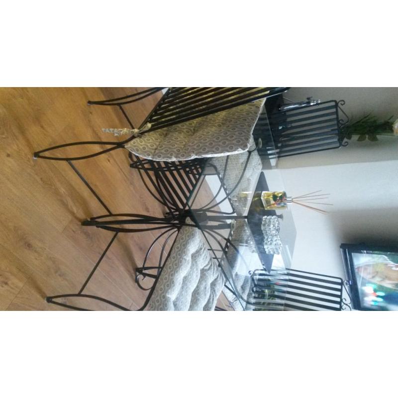 Solid wrought iron dinning table with 4 high back solid chairs,