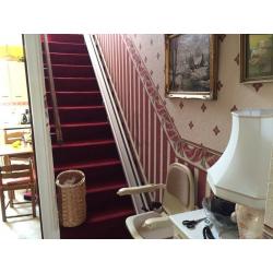 Straight track stairlift.