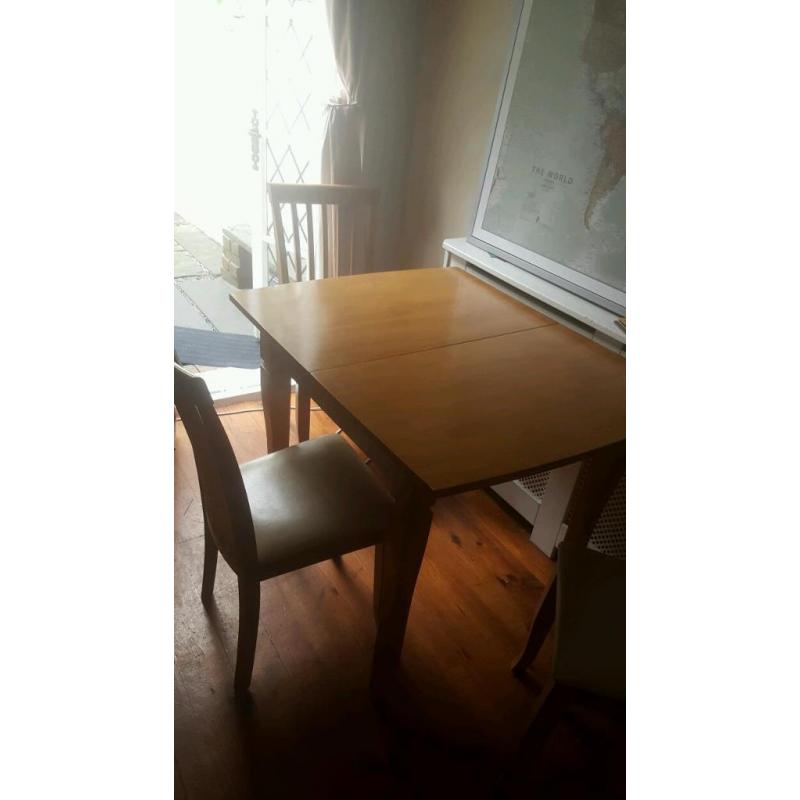 Dining table and 4 chairs