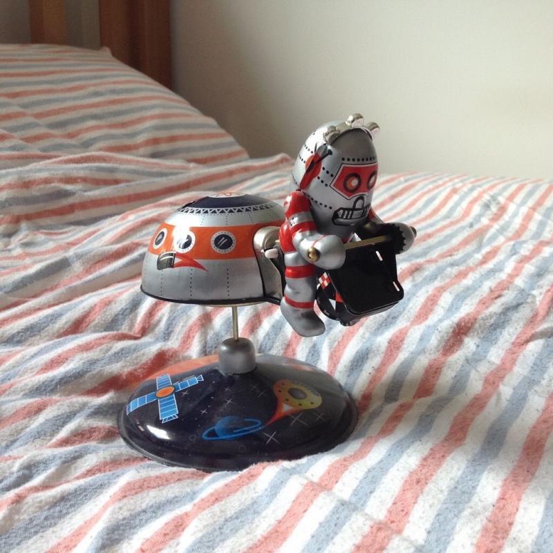 3 toy metal robots in good condition