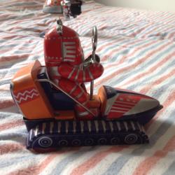 3 toy metal robots in good condition