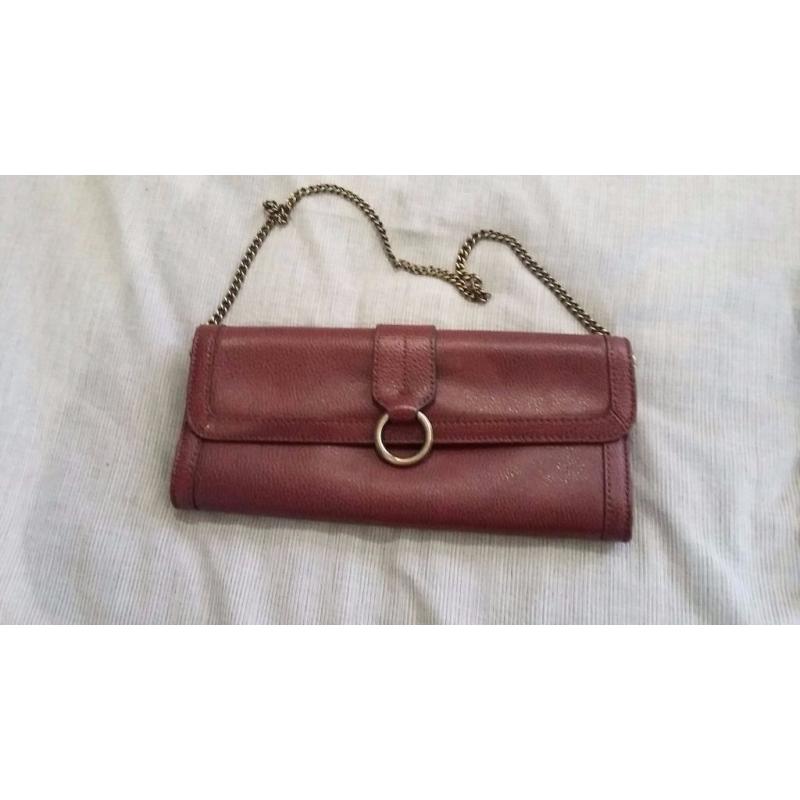 Banana Republic women’s deep red leather clutch with shoulder chain/strap