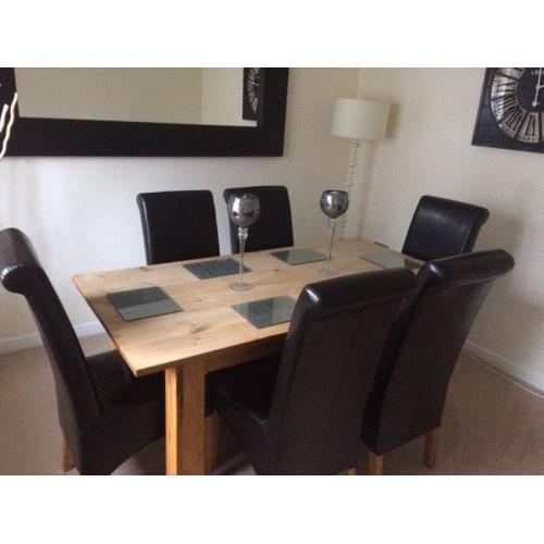 Solid oak table and chairs