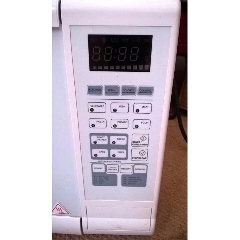 Kenwood 28 litre white combination microwave for spare/repairs