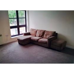 Brown 3 seater sofa with chaise lounge and footstool