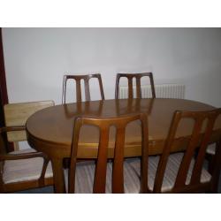 Extending Dining Table and 6 Chairs.